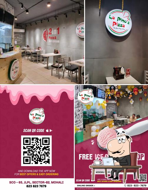 Take a seat at one of the tables at La Pino'z Pizza-Sector 82, Ind. Area, SAS Nagar, Punjab
