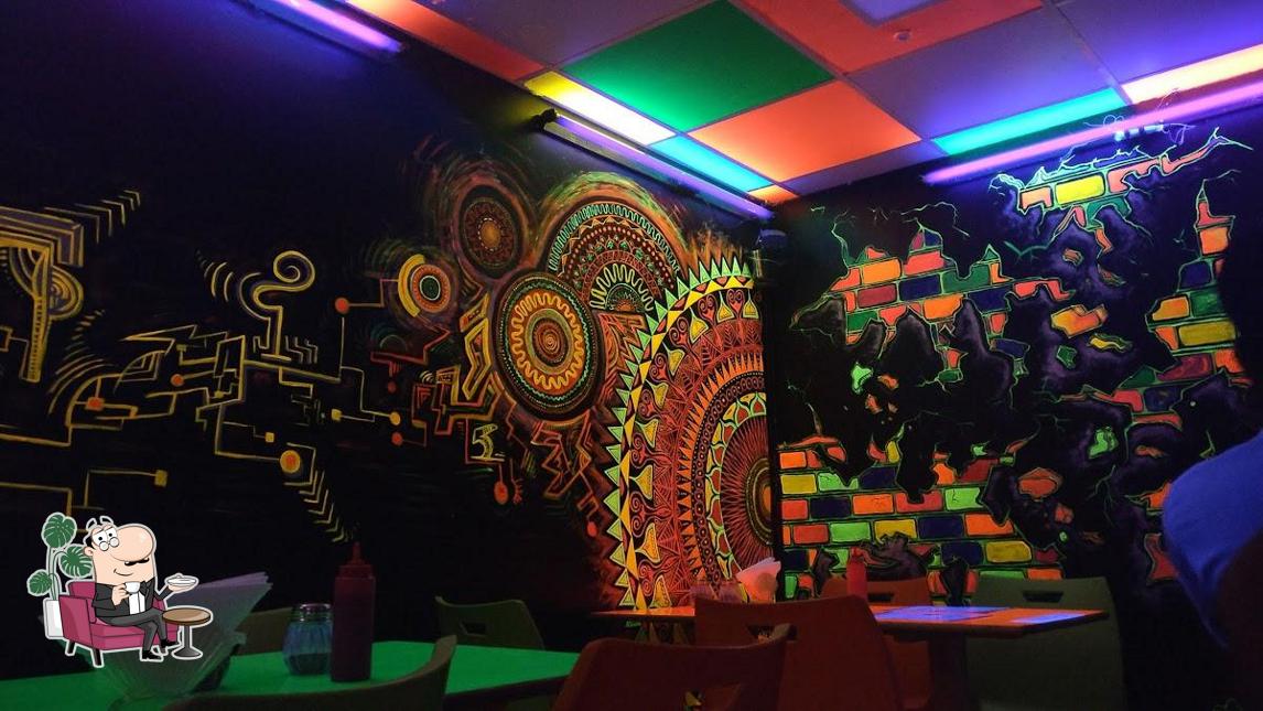Take a seat at one of the tables at Cafe 29
