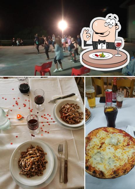 Guarda la immagine che mostra la cibo e interni di Pizzeria Ristorante Il Rustico