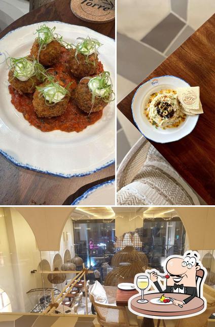 The image of Torre - Gourmet Dining & Tapas Bar’s food and interior