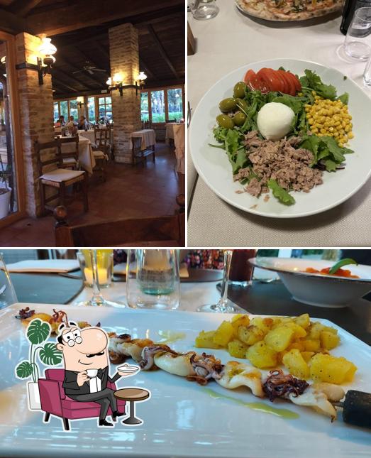 La immagine della interni e cibo di Ristorante Alla Fattoria
