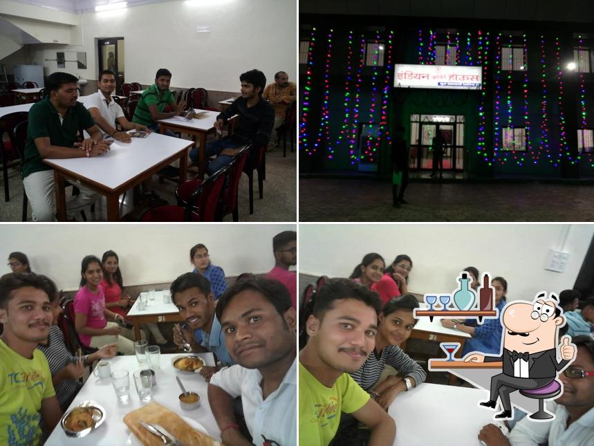 Take a seat at one of the tables at Indian Coffee House