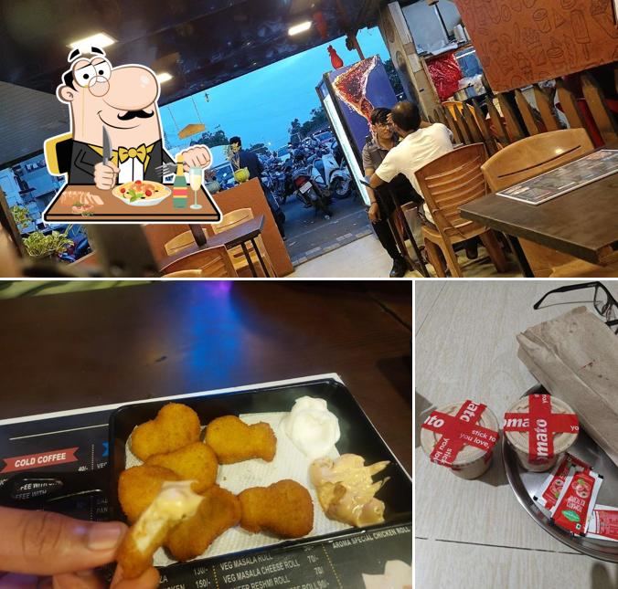 The photo of food and interior at Cafe Aroma