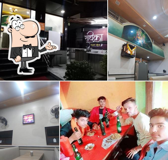 Take a seat at one of the tables at Radhika Pure Veg