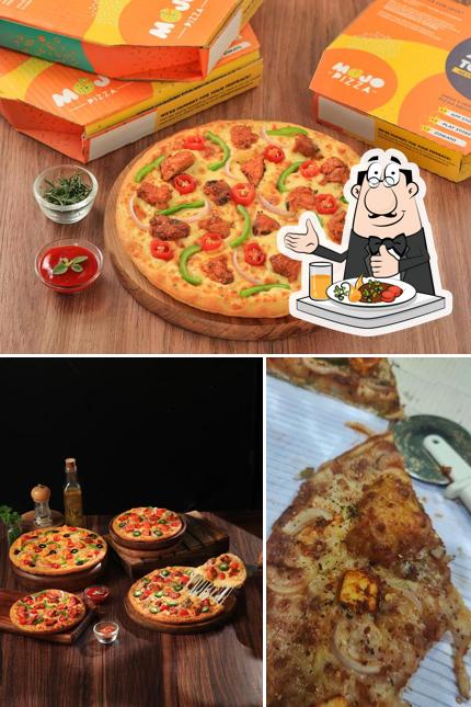 Among different things one can find food and interior at MOJO Pizza - 2X Toppings