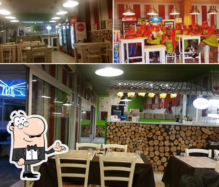 Dai un'occhiata agli interni di Che Pizza?!