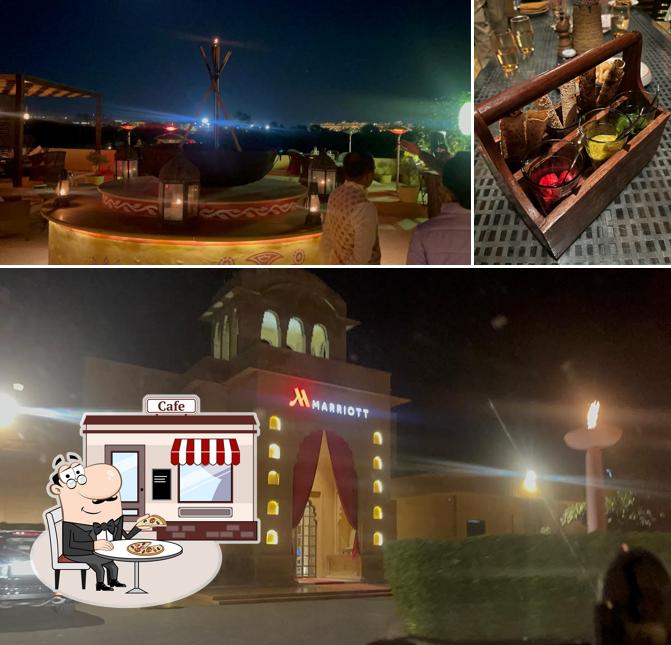 The photo of Wyra - Rooftop Restaurant in Jaisalmer’s exterior and food