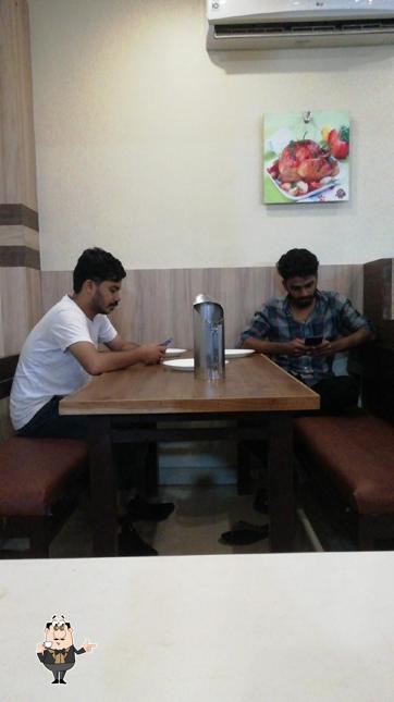 Enjoy a drink at KCF Food Corner