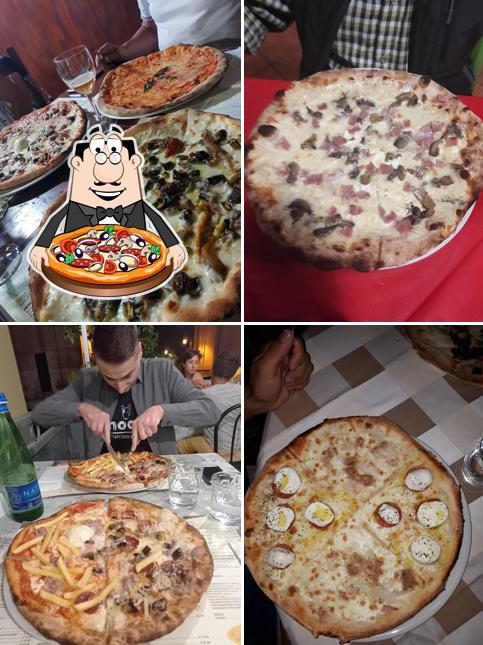 Prenditi una pizza a Taverna Magnum