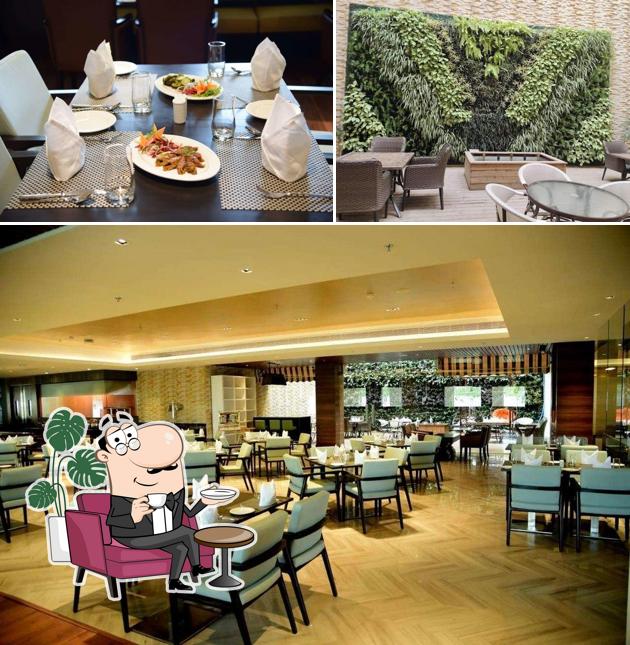 Check out how Mosaic - Country Inn & Suites by Radisson Zirakpur looks inside