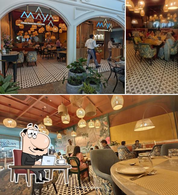 Take a seat at one of the tables at Maayaa - Culinary Exotica from South India