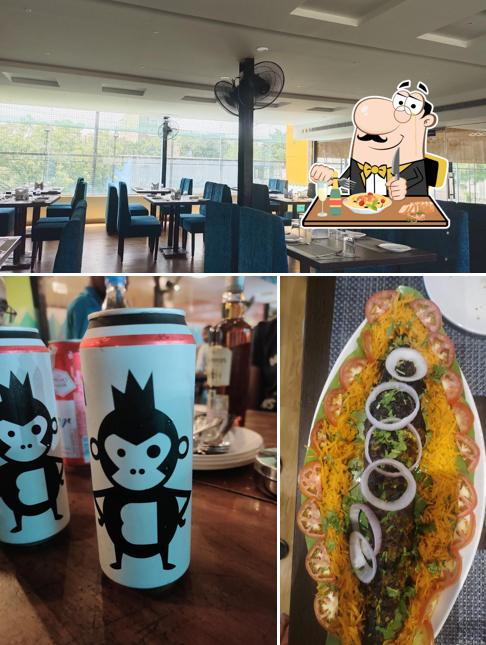 Take a look at the picture depicting food and interior at Bluemoon Elite Sports Bar and Family Restaurant