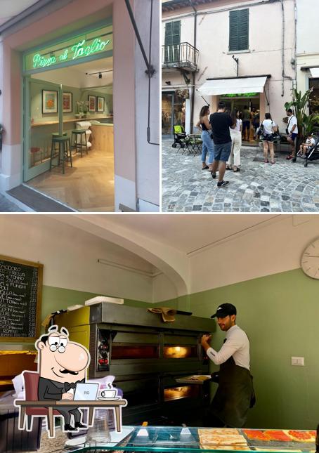 Questa è la foto che presenta la interni e cibo di La Romana Pizzeria del Centro Storico