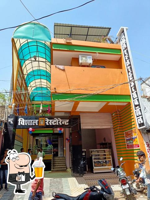 Enjoy a beverage at Vishal Restaurant and Ustav Hall