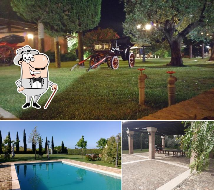 Puoi goderti l'aria fresca da seduto all'esterno di Resort La Cascina