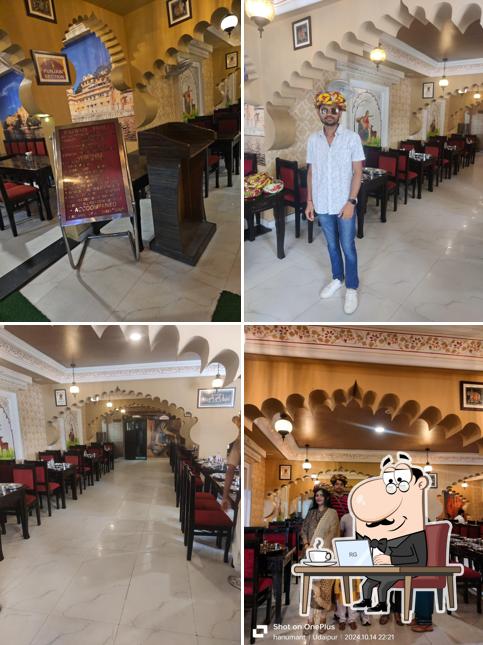 Take a seat at one of the tables at Rajwadi Thal & Restro