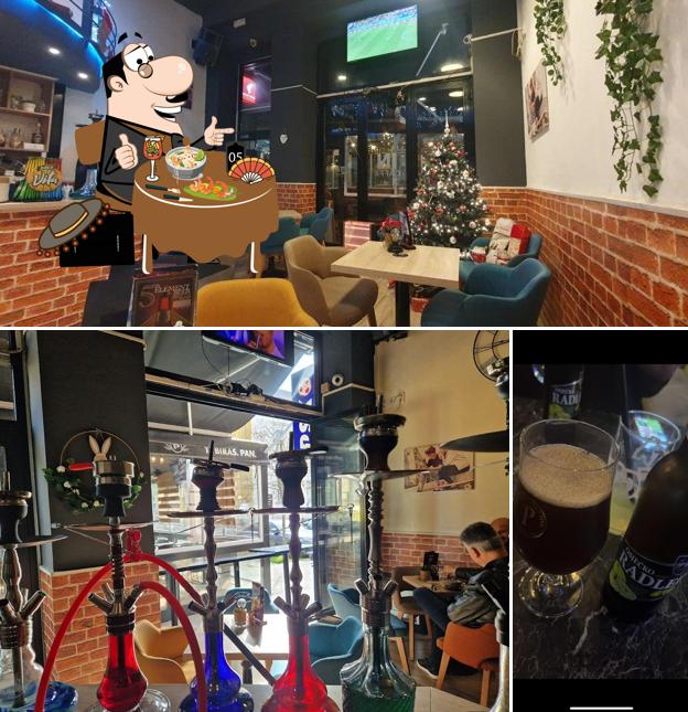 Tra le varie cose da Caffe bar IN si possono trovare la cibo e interni