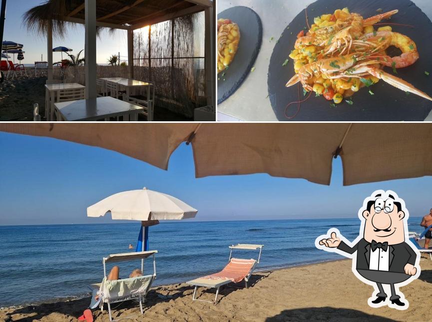 Guarda la immagine che raffigura la interni e cibo di Primo cancello Paradise Beach