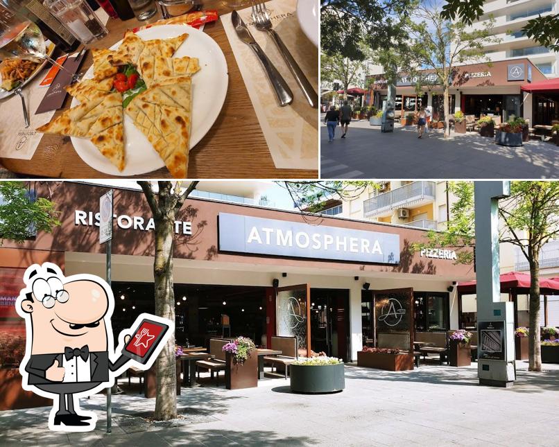 La foto di esterno e cibo da Atmosphera Ristorante Pizzeria | Lignano