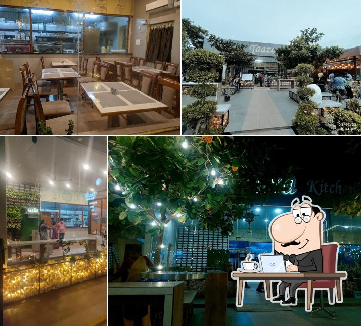Take a seat at one of the tables at TAAZA KITCHEN