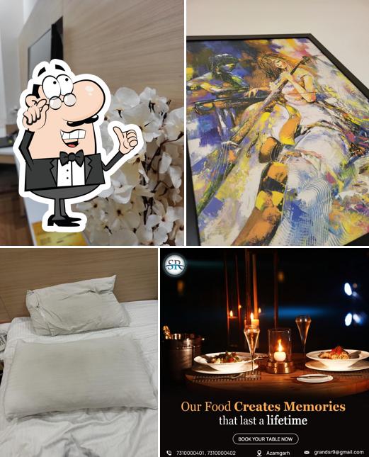 Take a seat at one of the tables at HOTEL GRAND SR