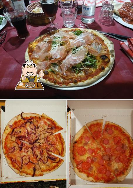 Prenditi una pizza a Ristorante Pizzeria Madamadorè - Il Bocconcino Snc