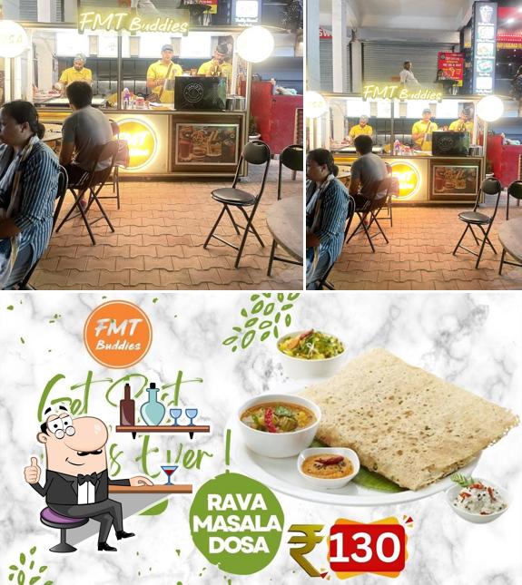 This is the picture showing interior and food at FMT Buddies South Indian Cafe