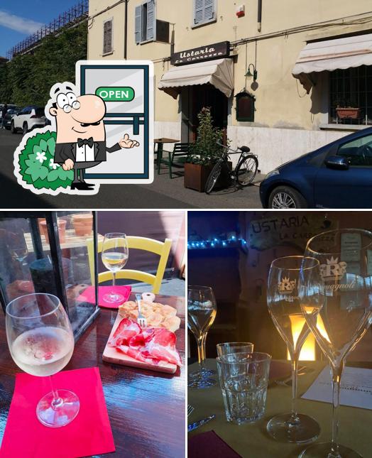 Questa è la foto che raffigura la esterno e vino di Ustaria la Carrozza