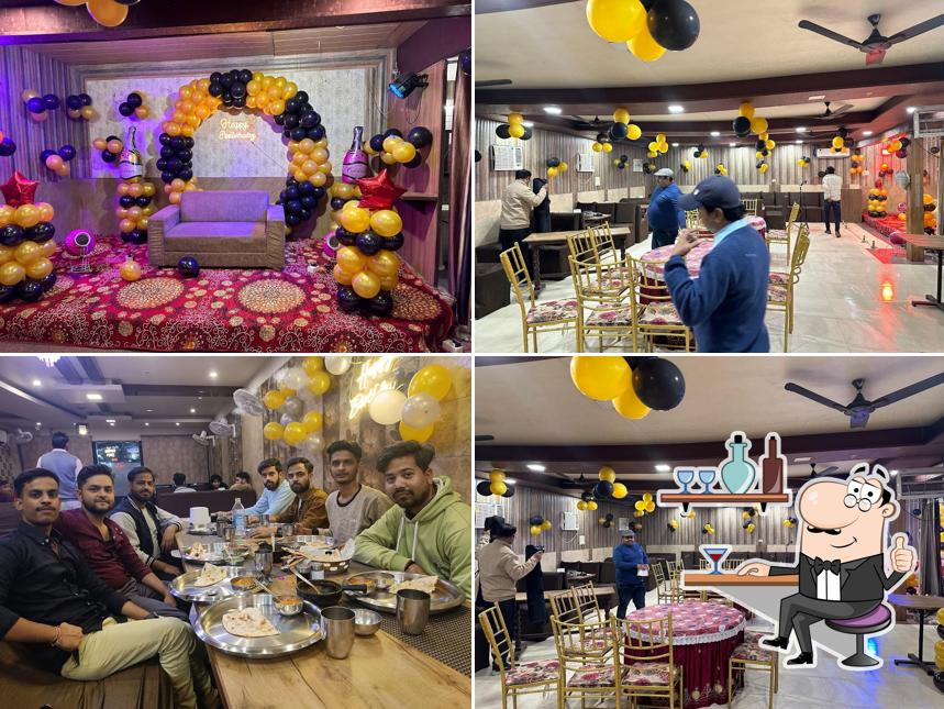 Take a seat at one of the tables at Dawat Restaurant & Party Hall - Best Party Halls in Rewari Best Restaurants in Rewari
