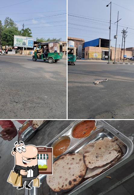 This is the photo showing exterior and food at INDIRA RASOI YOJNA 402