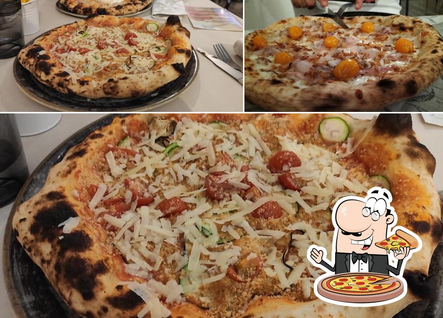 A Pizzeria il Gufetto, puoi prenderti una bella pizza