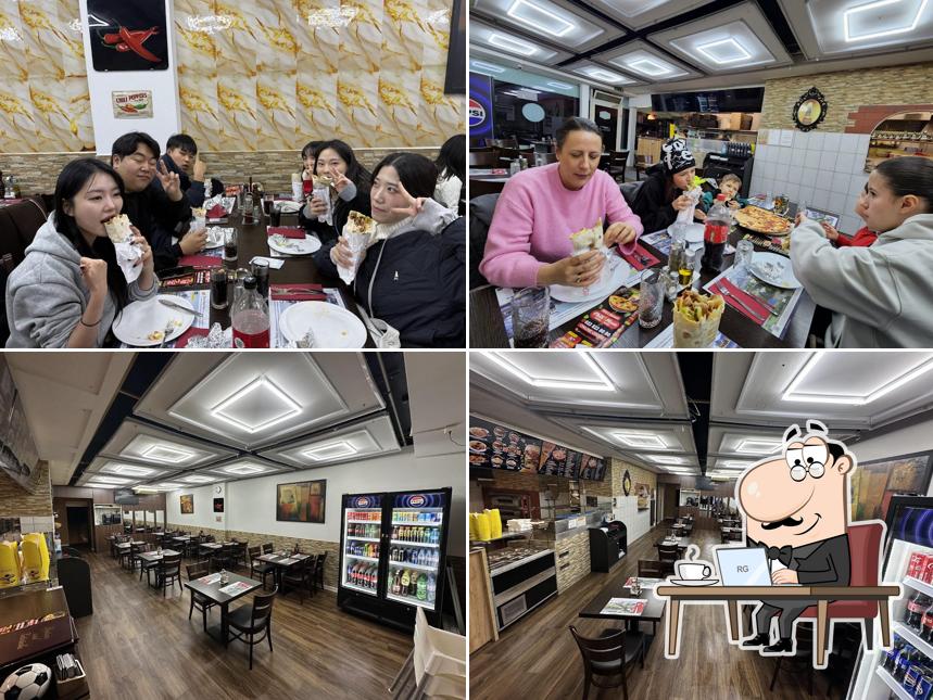 Siediti a un tavolo di Chili Pizza. مطعم بلودان سوري