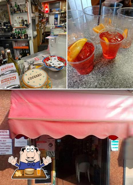 La foto della cibo e interni di Il Coguaro