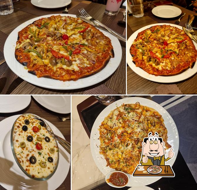 Get pizza at Phoenix Resturant