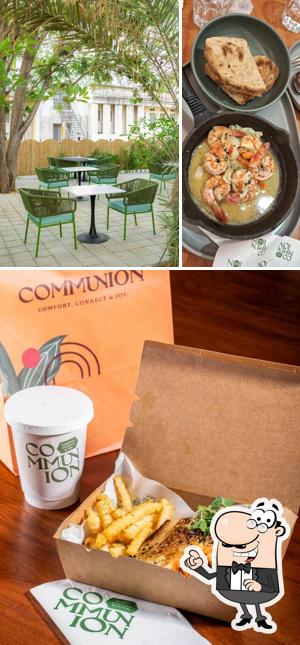 Take a seat at one of the tables at Communion Cafe Pune