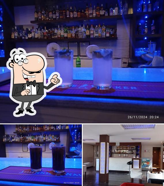 Check out the image displaying interior and beverage at Pint O' Fun