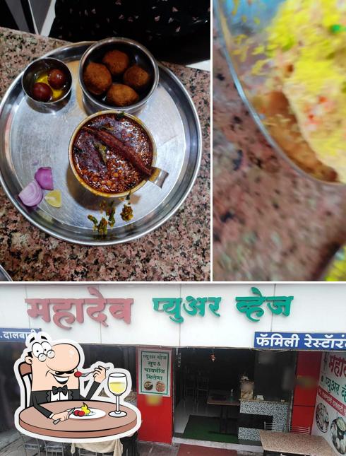 Mahadev Pure Veg is distinguished by food and interior