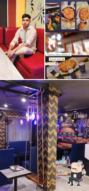 Check out how Pizzeria Bistro Sharda Rd looks inside