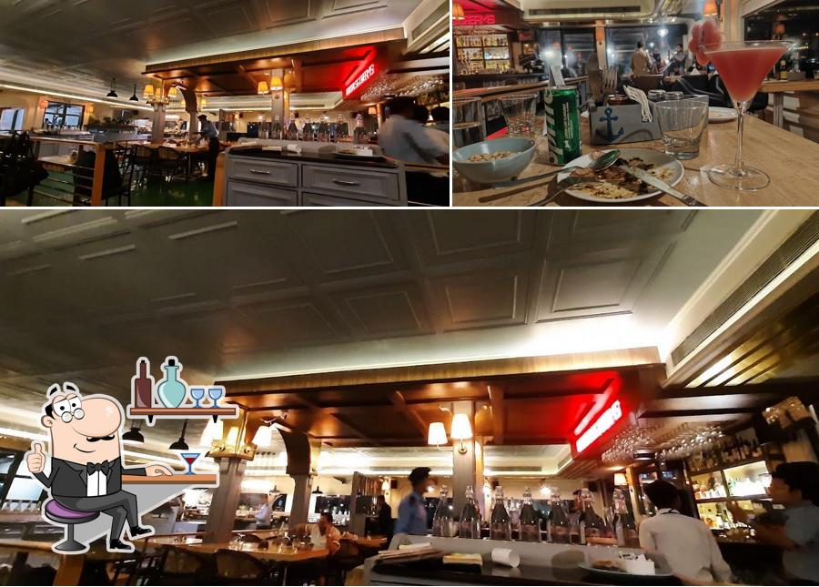 Take a look at the picture displaying interior and food at Bridge Bistro Bar