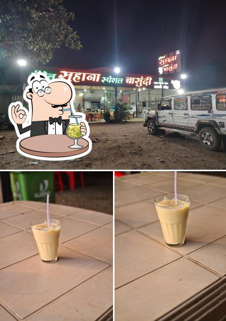 Check out the image depicting drink and exterior at Hotel Suhana
