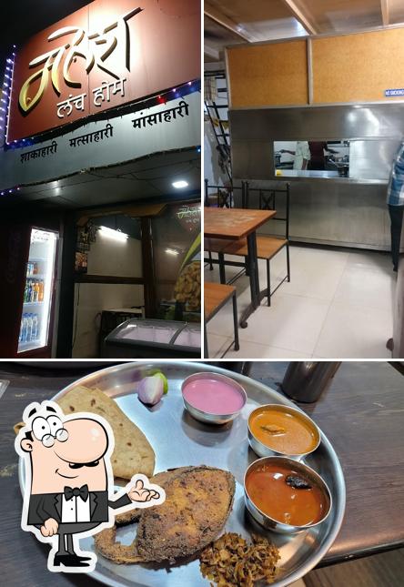 This is the picture depicting interior and food at HOTEL MAHESH LUNCH HOME