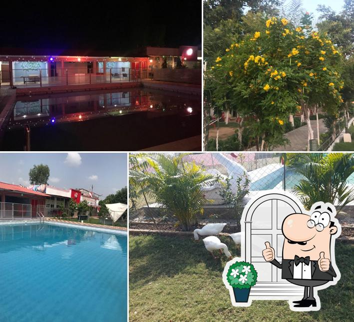 Check out how MIDWAY PURE VEG RESTAURANT & RESORT looks outside