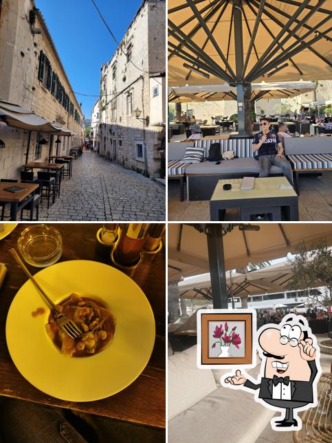 Siediti a un tavolo di Cocktail Bar Dominik