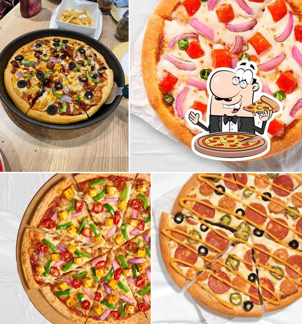 Pick pizza at Pizza Hut Piplod, Surat