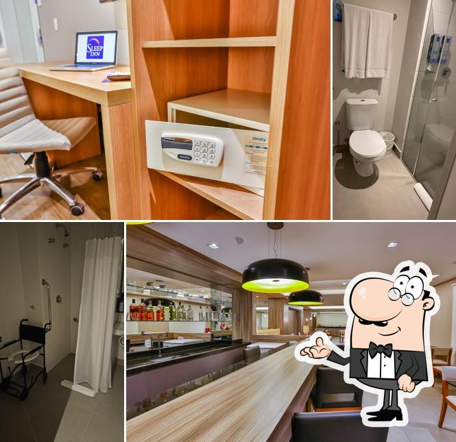 Sente em uma das mesas no Sleep Inn Guarulhos
