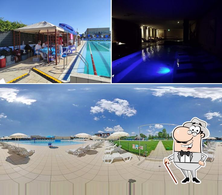 Puoi goderti l'aria fresca da seduto all'esterno di Campus Aquae