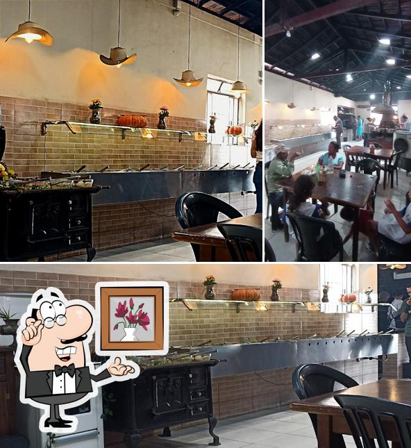 O interior do Aconchego Restaurante