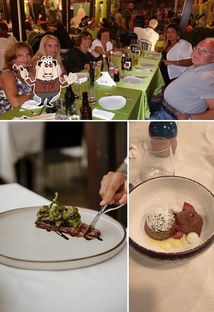 Questa è la foto che presenta la cibo e bancone da bar di Olì Olà