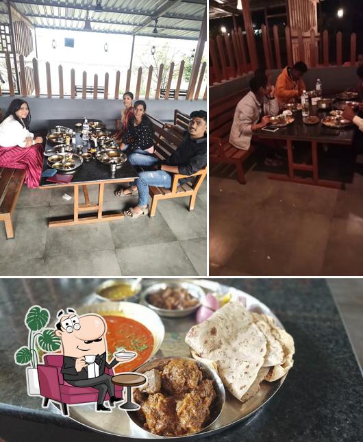 The image of interior and food at Hotel Aaisaheb Veg - Nonveg