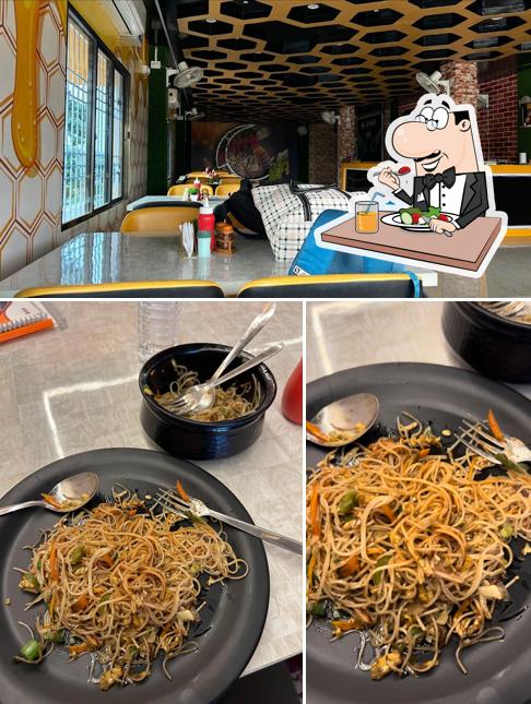 Take a look at the picture depicting food and interior at Foodcosta Assam